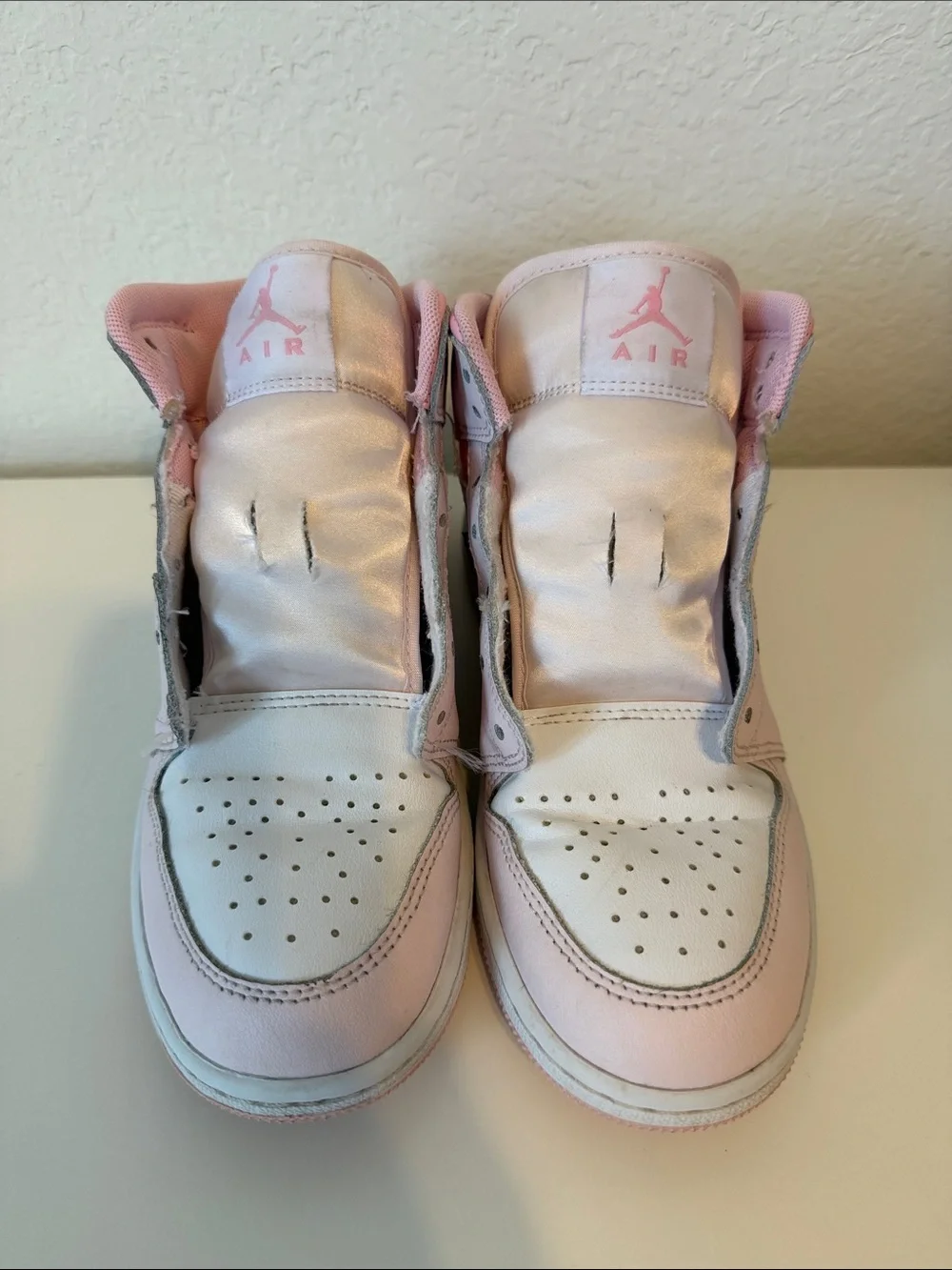 Nike Air Jordan Kids Pink and White High-Top Sneakers with Pink Swoosh